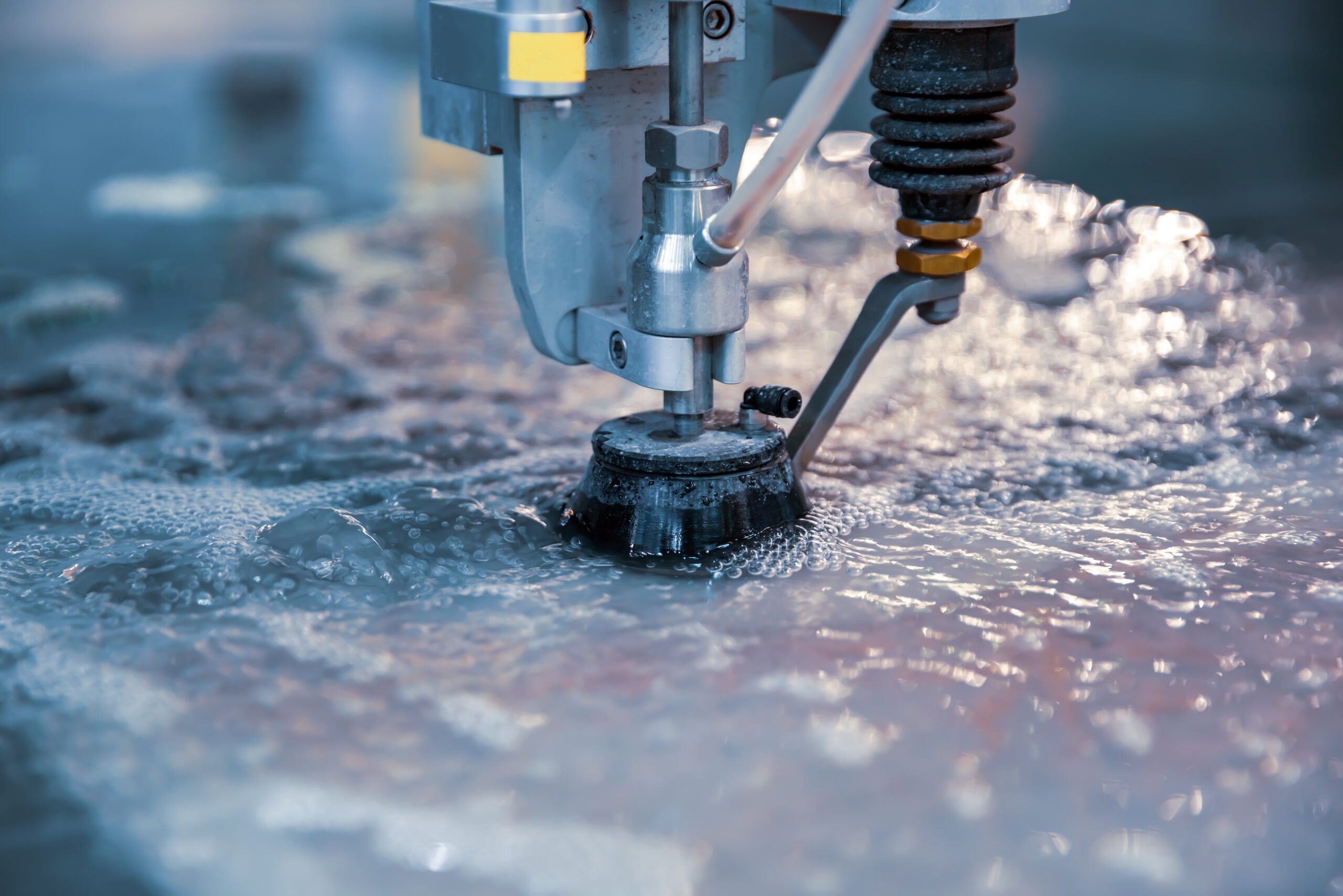 CNC water jet cutting machine modern industrial technology.